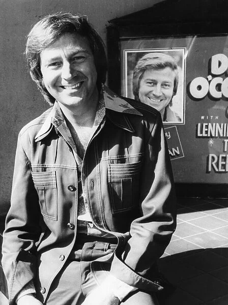 Des O Connor poses outside the Coventry Theatre where he is appearing in the '