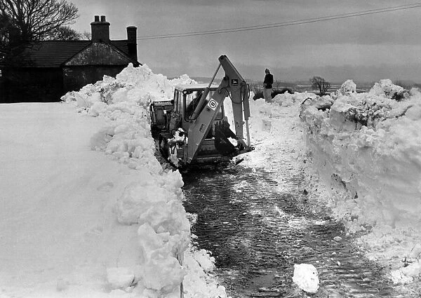 Digger tries to clear a way through, on the road from Pentre Meyrick, to Llantwit Major