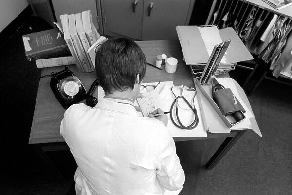 Doctors: The ever busy desk of an overworked doctor, often interrupted by telephone calls