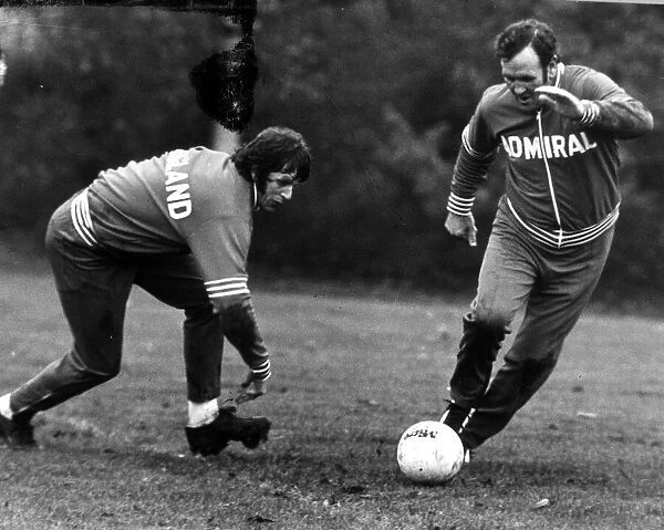 Don Revie joins in on the training to beat Mick Channon May 1976 ***