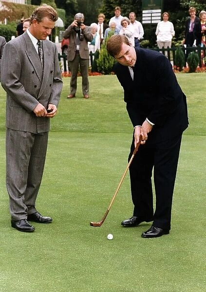 Duke Of York playing Golf with an Antique Set of Clubs presented to him at Wentworth by
