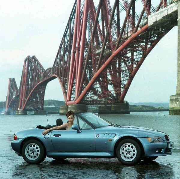 Eileen Catterson with Z3 BMW convertible car May 1998 at Forth Rail bridge