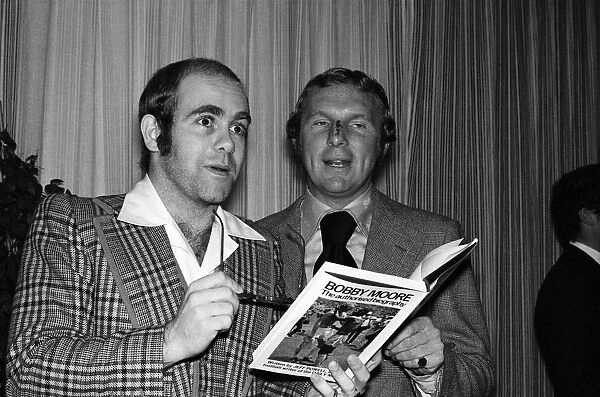 Elton John with Bobby Moore at the launch of Moores book 'Bobby Moore'