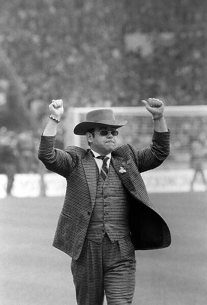 Elton John chairman of Watford on Wembley pitch 1984 before kick off of FA cup