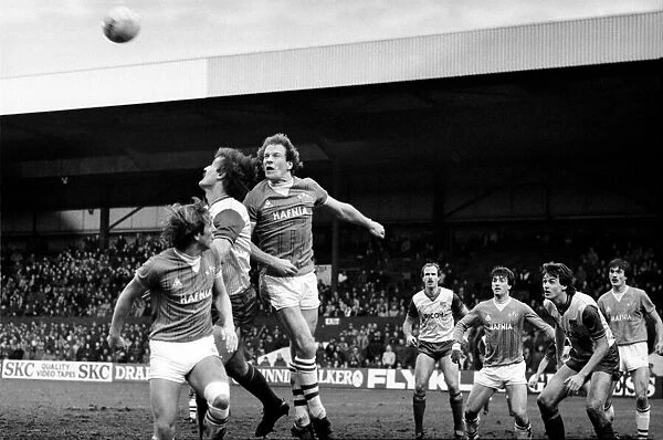 English FA Cup match Stoke City 0 v Everton 2 Andy Gray jumps up to clear