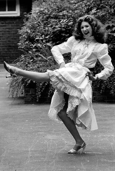 Entertainment: Dancing: A woman poses as she dances the Can-Can. July 1981 81-03766-007