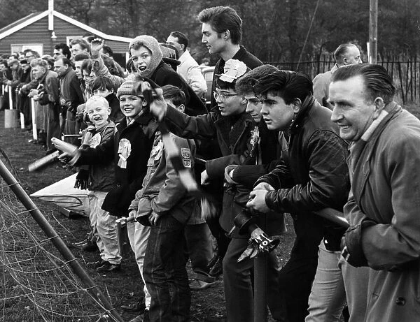 Enthusiastic Alvechurch supporters watch their team in action in a cup match against