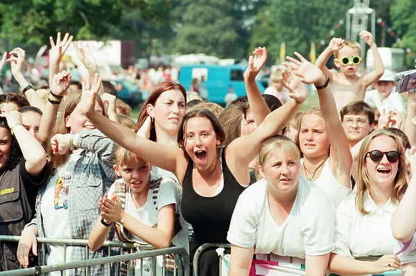 Fans of Peter Andre, cheer as he performs at Fun Day, Stewart Park, Marton, Middlesbrough