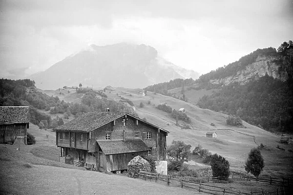 Farmhgouse high up in the Alps above the town of Seelisburg in Switzerland. August 1936