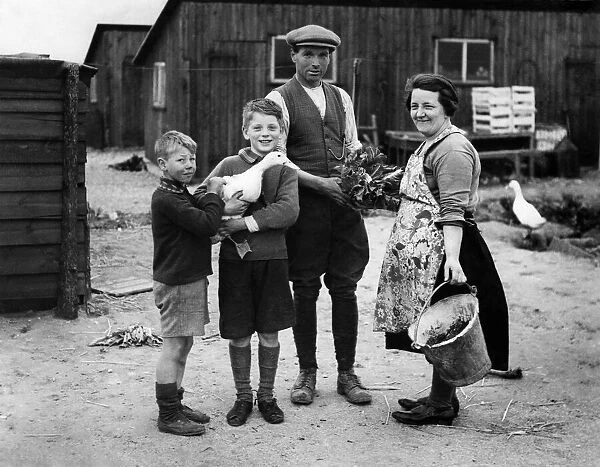 Farms, smallholding. Mr William Whing with his wife and two of his five sons