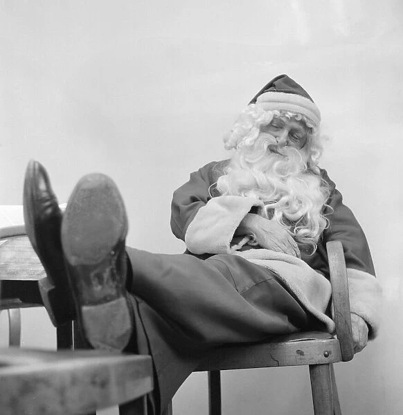Father Christmas, having a nap at Robinsons Fish and Chips, Teesside, December 1972