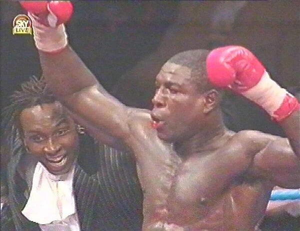 Frank Bruno and Nigel Benn celebrate after the fight with Oliver McCall for