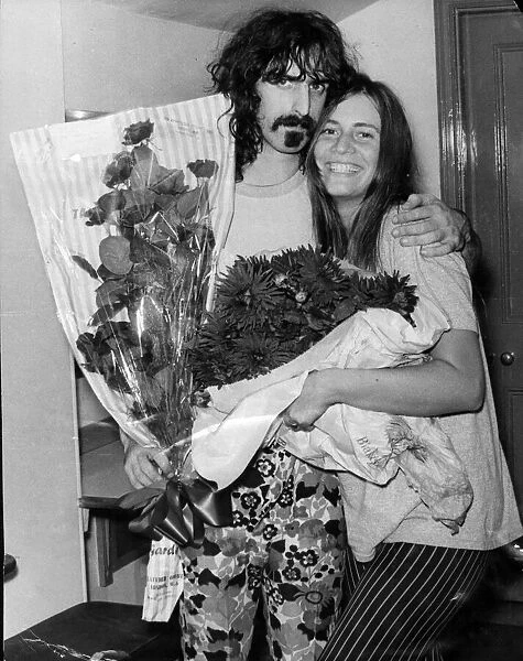 Frank Zappa. American musician. Pictured in London with the singer of his group