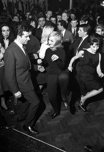 Frankie Vaughan singer Entertainer dancing The Twist Jan 1962 Frankie dances at