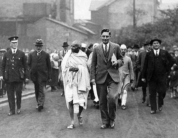 Gandhi seen here during his tour of the Lancaster cotton mills during September 1931