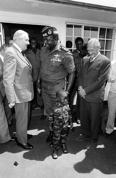 General Idi Amin introduces his son to Foreign Secetary James Callaghan