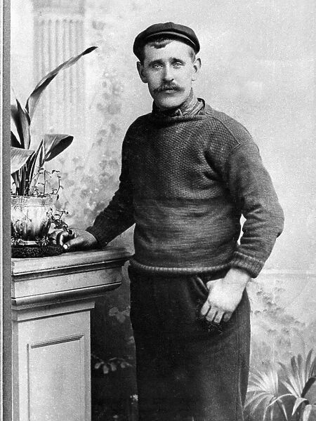 A gentleman wearing a gansy, or jumper at the strart of the century