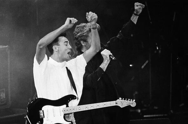 George Michael and Andrew Ridgeley performing at the Stand by Me