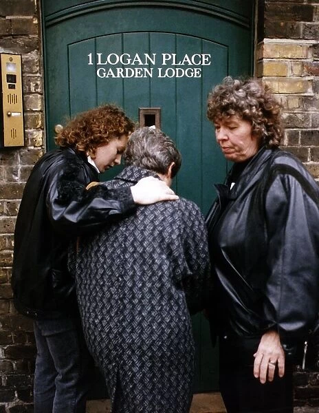 Grieving Fans stand outside 1 Logan Place mourning the death of Freddie Mercury singer