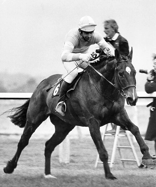 Grittar ridden by Dick Saunders on the run in at Aintree to become the winner of the 1982
