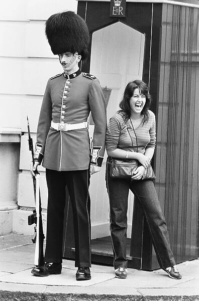 A guardsman standing outside Clarence House, the residence of the Queen Mother
