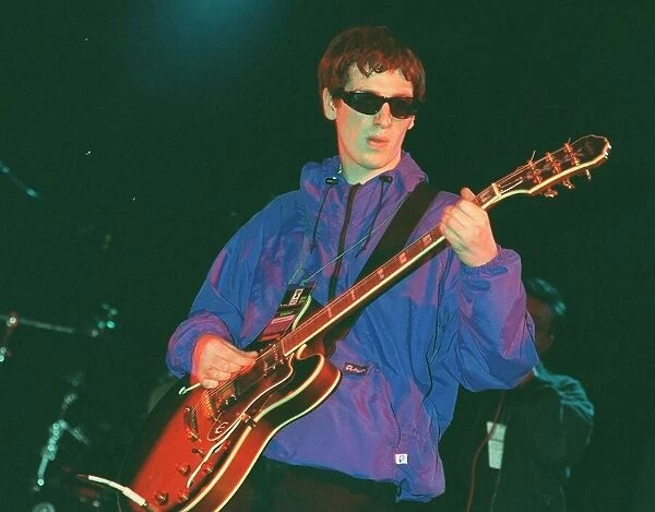 Guitarist with pop group Nowaysis Oasis tribute band at T in the Park on stage in NME