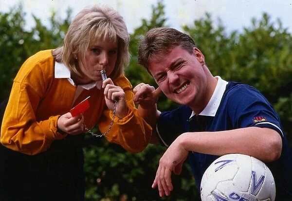 Hazel Irvine TV presenter September 1990 blowing a whistle into Jim Whites ear