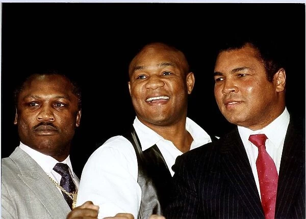Former heavyweight boxing champion Joe Frazier (left) pictured with George Foreman