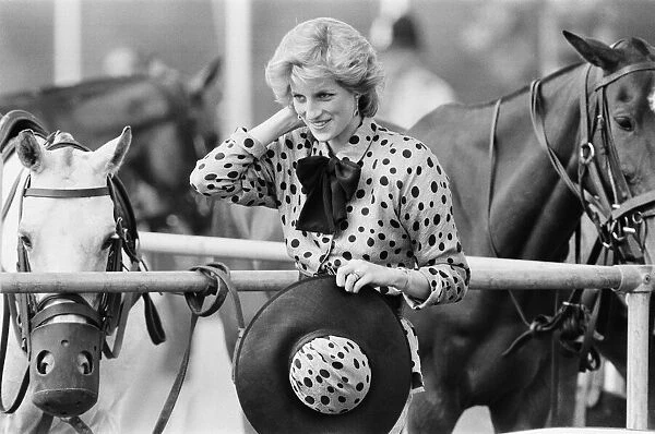 HRH The Princess of Wales, Princess Diana, watches Prince Charles playing Polo