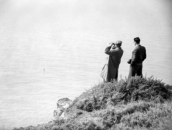 I see no ships, two gentleman look across the English Channel from Beachy Head