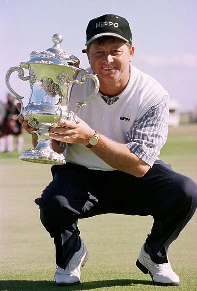 Ian Woosnam Welshman holds the trophy after winning the Scottish Open Golf title at