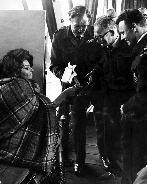 Italian film star Sophia Loren sign autographs during a break in filming for the film