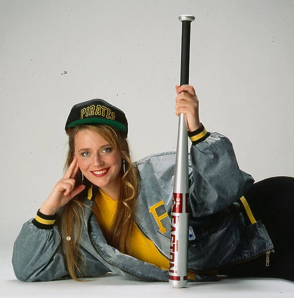 Jacket fashion - model wears grey baseball jacket, January 1991 Pirates cap