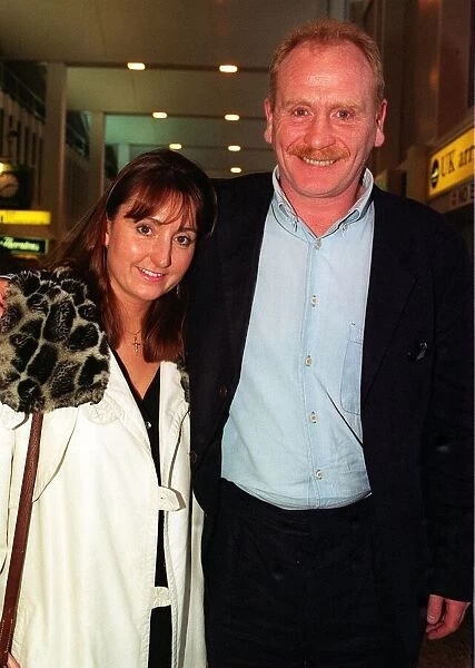 JAMES COSMO ACCOMPANIED BY ANNE HARRIS ARRIVE AT GLASGOW AIRPORT FOR THE SCOTTISH PEOPLES