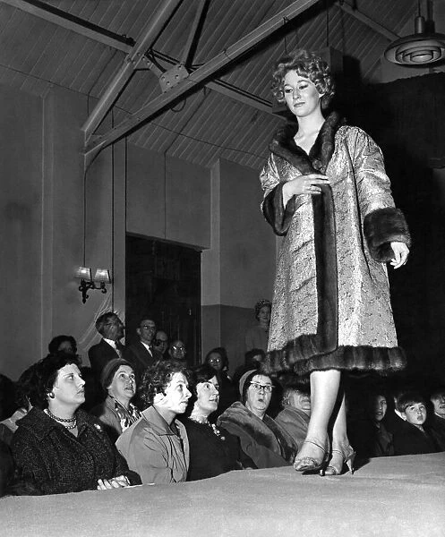 Janet Thompson in a brocade-lined wild mink, worn inside out displays the coat