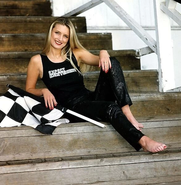 Jill McIntyre Miss Speedway snakeskin trousers Ichi Ni San T shirt checkered flag