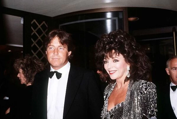 Joan Collins Actress with Bill Wiggins at golf tournament May 1987