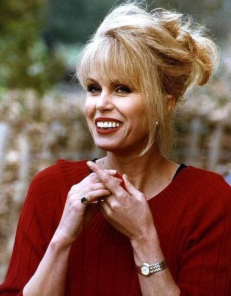 Joanna Lumley Actress posed up for Red Nose Day special crossed hands