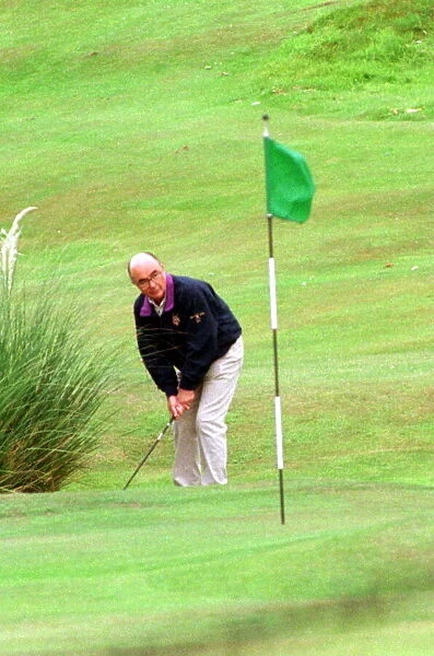 Joe Lewis playing golf July 1997 pitch and putt at the Turnberry Hotel course