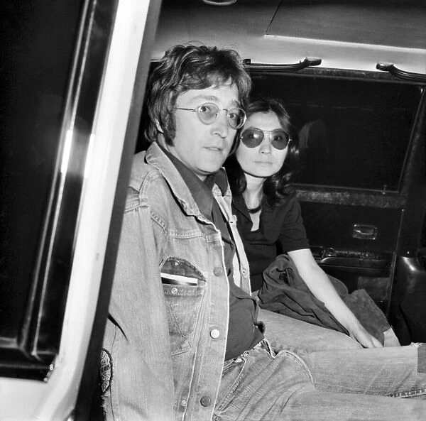 John Lennon and Yoko Ono on arrival at London Airport after returning from Majorca