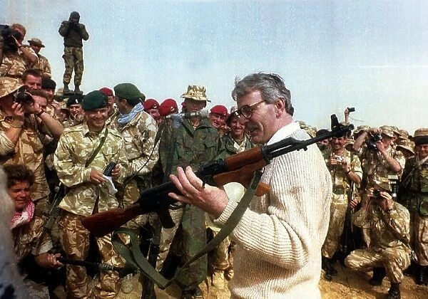 John Major MP in kuwait holding a russian made rifle