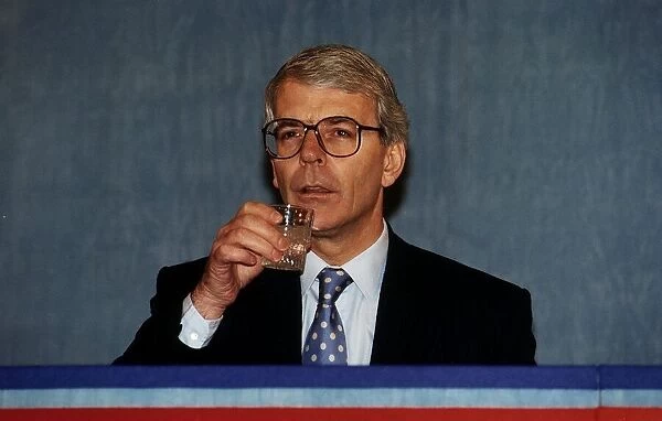 John Major MP Prime Minister drinking a glass of water at Conservative Party Conference