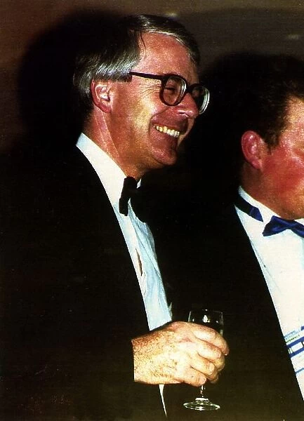 John Major Prime Minister in Blackpool drinking Champagne at after conference party