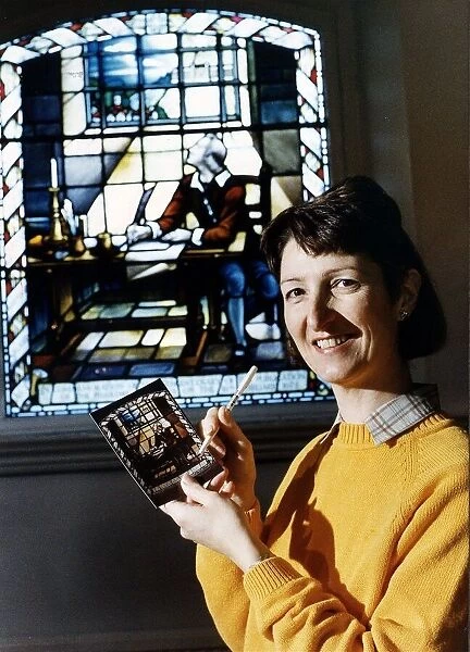 Joy Brodier stands in front of the window at the Bunyan Freechurch at Bedford pictured