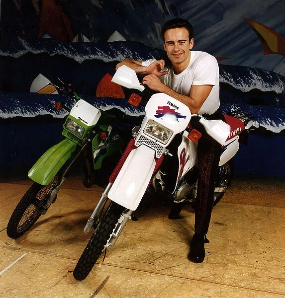 Julian McMahon, Australian actor, sits on motorbike