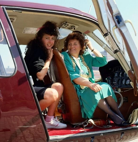 Katie Murphy with Susan Baird in helicopter May 1988