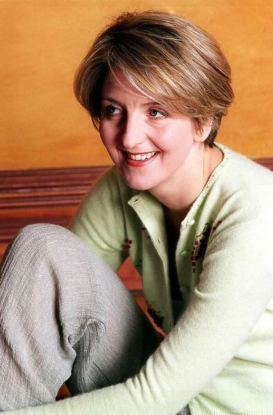 Kaye Adams TV presenter February 1999 wearing green cardigan linen trousers