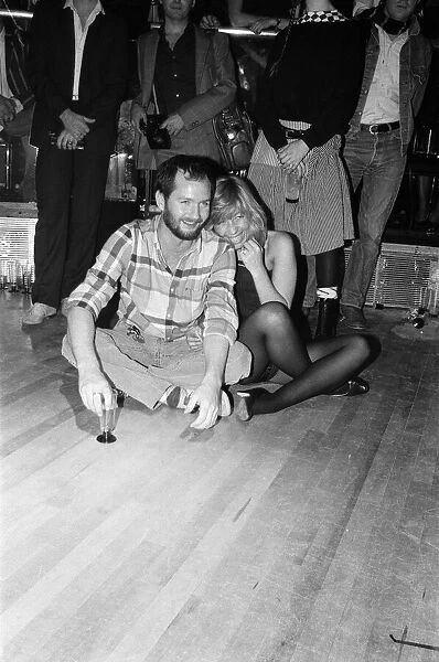 Kenny Everett and guest at the opening of The London Hippodrome nightclub