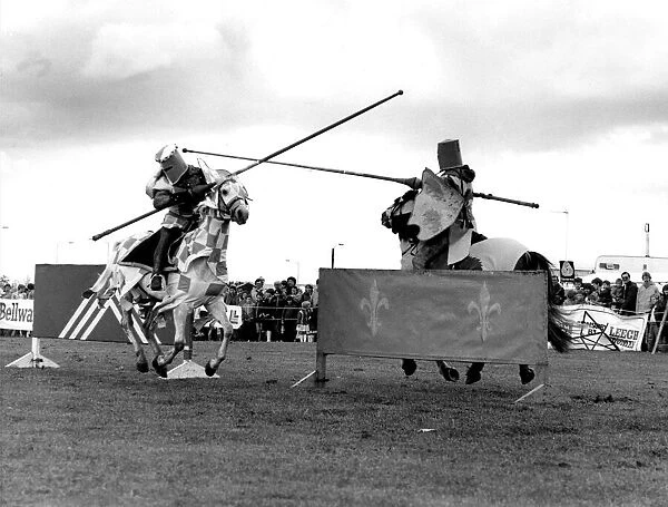 Knights on horseback clash at a jousting tournament in June 1984