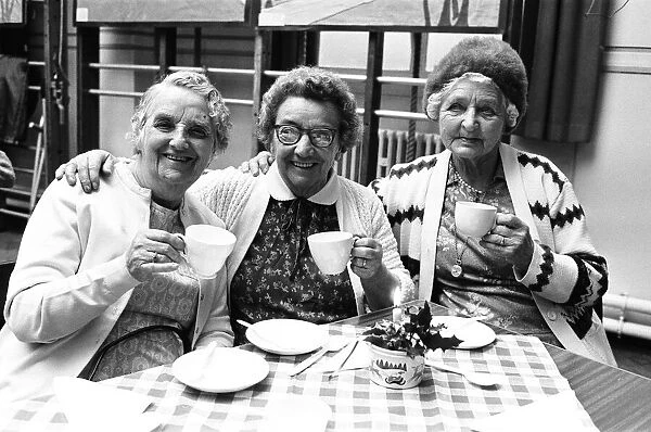 Three ladies seen here enjoying a nice cup of tea after their Christmas party